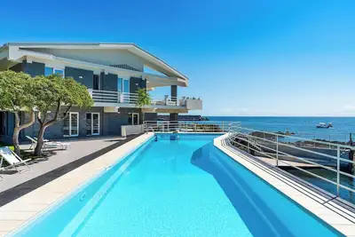 Image de Villa Giulia is a luxury seafront villa with private pool