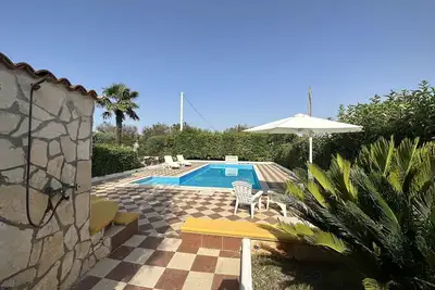 Image de Maison de vacances avec climatisation, Wifi, piscine privée, Tv, véranda, près de Ostuni