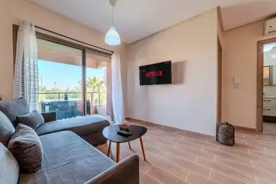 Image de Élégant Appartement : Piscine, Golf et Wifi