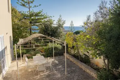 Image de Mulberry tree house surrounded by nature and with breathtaking sea view of the coast