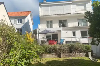 Image de Appartement dans villa Bauloise T3 Entre Mer et Forêt avec terrasse privée, jardin privé et Wi-Fi