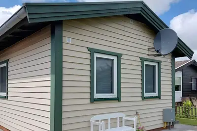 Image de Maison de vacances 'Kleines Schweden' avec vue sur lac, terrasse privée et Wi-Fi