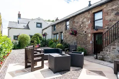 Image de A cottage that sleeps 8 guests in 4 bedrooms