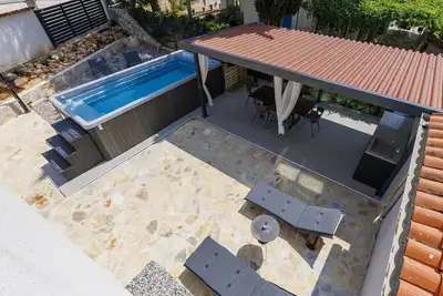 Image de Confortable appartement pour 5 personnes avec Wifi, climatisation, piscine, Tv et terrasse