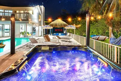 Beachfront Oasis w/ Htd Pool Cinema Game-Room Tiki