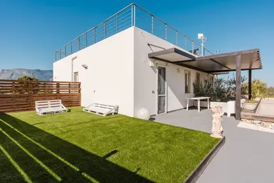 Image de Appartement 'Villa Giulia Sud' avec vue sur la montagne, terrasse privée et climatisation