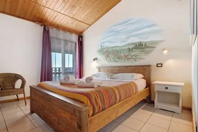 Image de Chambre 'Matrimoniale Con Balcone' avec vue sur lac, jardin partagé et Wi-Fi