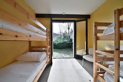 Image de Maison d'hôtes 'La Trente-Trois - Chambre 4 Pers' avec vue sur la montagne, terrasse et jardin privé
