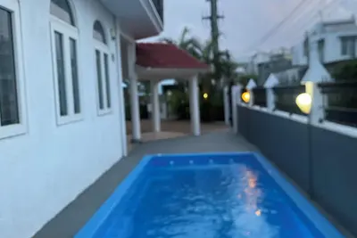 Image de Villa à pereybere avec 4 chambres et 3 sdb séjour grand salon climatisé wifi