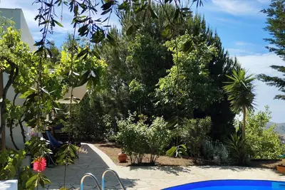Image de Sheltered house in the mountains with sea views and private pool.