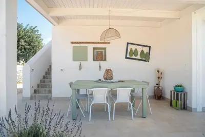 Image de Mediterranean-style villa surrounded by centuries-old olive and lemon trees