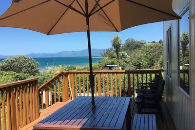Image de ***New Listing*** Beachfront bach - your slice of paradise.