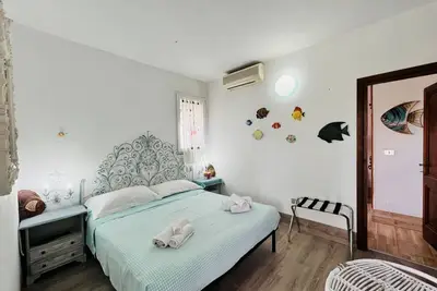 Image de Camera Acquario - Villa Flores