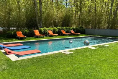 Image de Stylish and recently renovated home with pool, sunlit open floor plan, . . .