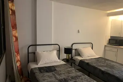 Image de Urban Oasis: Cozy Studio in Calgary's Heart