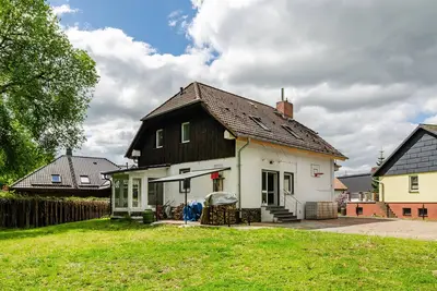 Image de Appartement \"Wunderschöne\" avec terrasse privée, jardin privé et Wi-Fi