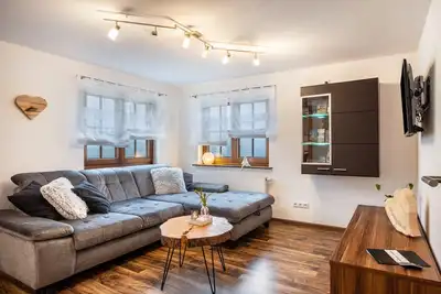 Image de Appartement 'Herzglück' avec vue sur les montagnes, terrasse partagée et Wi-Fi