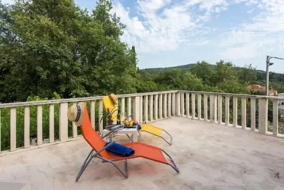Image de Apartments Villa Maslina - Two Bedroom Apartment with Terrace and Garden View