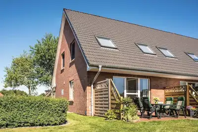 Image de Vacation cottage Zum SĂĽdstrand 9a