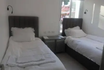 Image de A perfect vacation unit for a couple in Geula