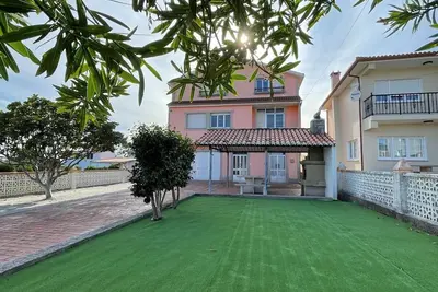 House in the middle of Carnota Beach, considered one of the best in Europe.