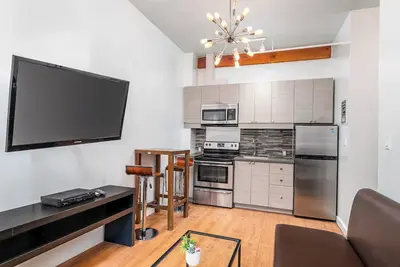 Image de Grande Suite au cœur du Centre-Ville de Montreal