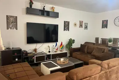 Image de Apartment meublé idéal pour une famille! Coin de repos idéal.