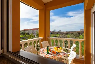 Image de Charmant appartement avec lit bébé, balcon privé, barbecue, WiFi