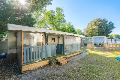 Image de Mobil-home à La Tremblade – Jardin privé, terrasse, aire de jeux et piscine partagée