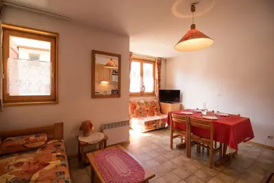 Image de Com213m : Wohnung in ruhiger Lage in der Nähe von kostenlosen Shuttles und dem Schwimmbad