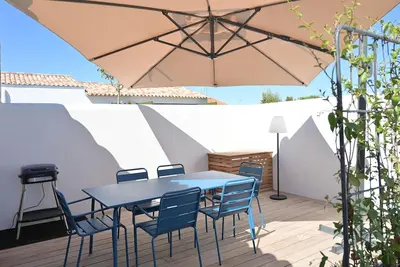 Image de Maison plain-pied avec parking privatif et climatisation
