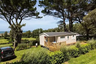 Image de Mobil Home Standard 25m2 (2 Schlafzimmer) + integrierte Terrasse 4m2 + Tv 4 Personen