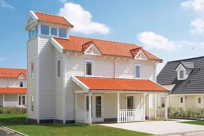 Villa, bains à remous et cheminée près du lac de Grevelingen