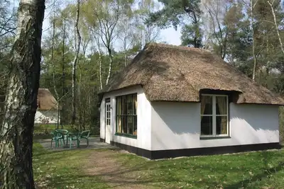 Image de Villa forestière à Herperduin avec bain à bulles