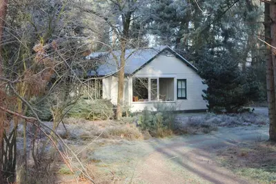 Image de Maison de vacances א Maarheeze avec jardin
