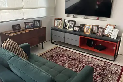 Image de Design and comfort in a spacious apartment with balcony and jacuzzi on a quiet street in Copacabana