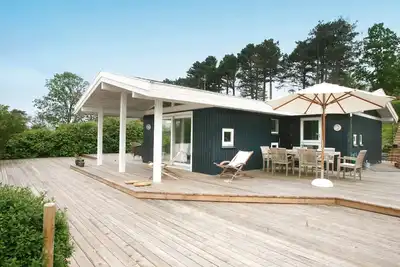 Image de Maison de vacances pour 6 a Dronningmølle-By Traum