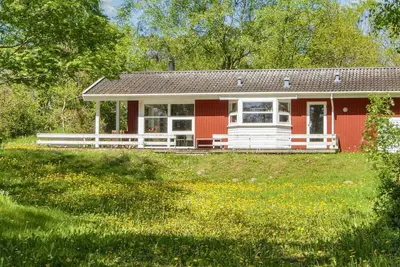 Image de Maison de vacances pour 8 a Glesborg-By Traum