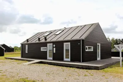 Image de Maison de vacances pour 8 a Brovst-By Traum