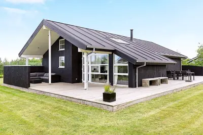 Image de Maison de vacances pour 8 a Brovst-By Traum