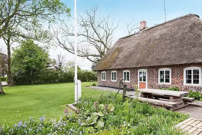 Image de Maison de vacances pour 4 a Bredebro-By Traum