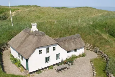 Image de Maison de vacances pour 3 a Løkken-By Traum