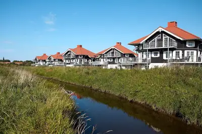 Image de Maison de vacances pour 8 dans un parc de vacances a Bogense