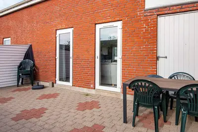 Image de Maison de vacances pour 6 a Rømø-By Traum