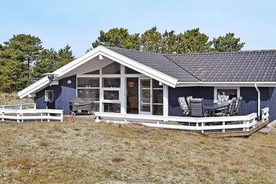 Image de Maison de vacances pour 8 a Fanø-By Traum