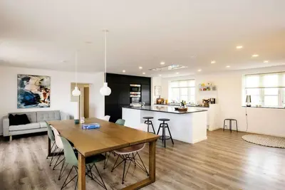 Image de Maison de vacances pour 8 a Bogense-By Traum