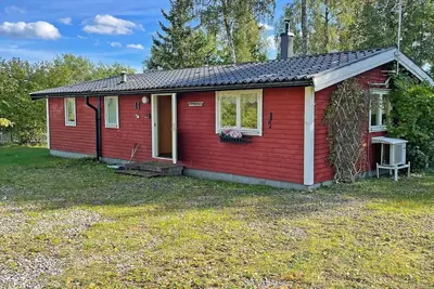 Image de Maison de vacances pour 6 a Vingåker-By Traum