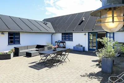 Image de Maison de vacances pour 8 a Pandrup-By Traum