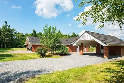 Image de Maison de vacances pour 8 a Oksbøl-By Traum