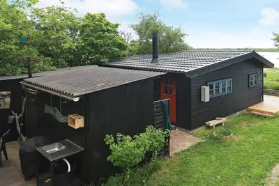 Image de Maison de vacances pour 4 a Bogense-By Traum